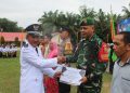 Desa Rantau Limau Manis Merangin Berulang Tahun Ke-143, Kades Aswani serahkan Piagam Penghargaan