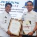 Pj Bupati Muaro Jambi Raden Najmi Serahkan DPA Tahun 2025 ke SKPD