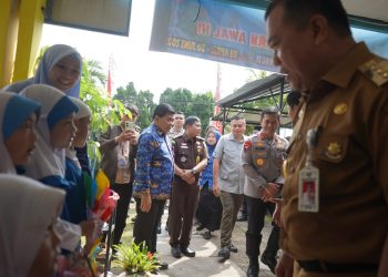 Launching Makan Bergizi Gratis, Gubernur Al Haris Pastikan Proses Lancar dan Menu Sehat untuk Anak
