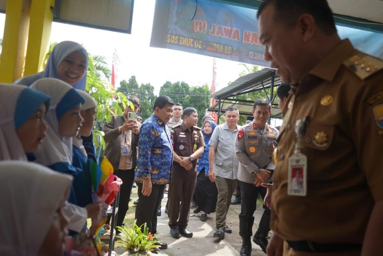 Launching Makan Bergizi Gratis, Gubernur Al Haris Pastikan Proses Lancar dan Menu Sehat untuk Anak