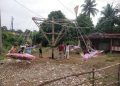 Lebaran Idul Fitri, Anak-Anak Bersemangat Naik Buaian Putar di Desa Sungai Ulak Kabupaten Merangin