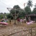 Lebaran Idul Fitri, Anak-Anak Bersemangat Naik Buaian Putar di Desa Sungai Ulak Kabupaten Merangin