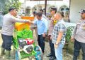 Kapolres Sarolangun Serahkan Bantuan Satu Unit Mesin Com Sheller Kepada GapoktanÂ