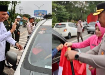H. Hurmin SE bersama Kapolres Sarolangun Berikan Bendera merah putih ke Pengandara Roda 4 dan Roda 2 di Kabupaten Sarolangun