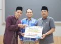 Bupati Tanjab Barat Serahkan Bantuan PetroChina untuk Korban Kebakaran Teluk Nilau