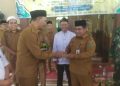 Camat Singkut Hadiri Penyaluran Zakat untuk 270 Warga, Bupati Hurmin Serahkan Bantuan di Sidomukti